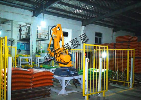 豆粕飼料全自動碼垛機 袋料機器人碼垛解決方案